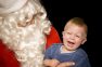 santa with crying child