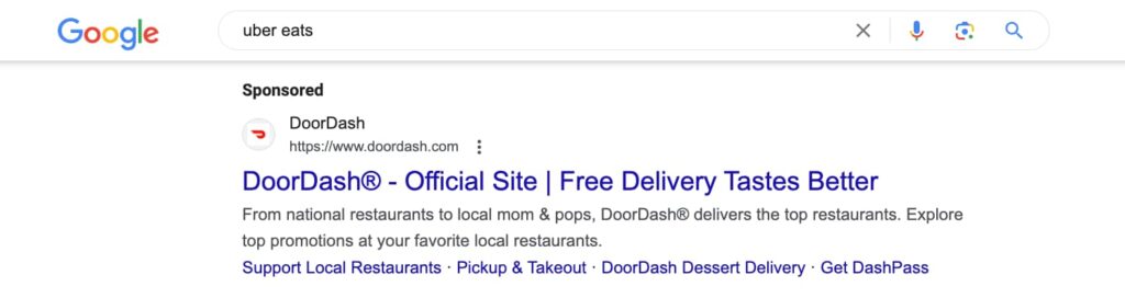 Screenshot of the search results page showing DoorDash's sponsored ad for their brand term "uber eats"